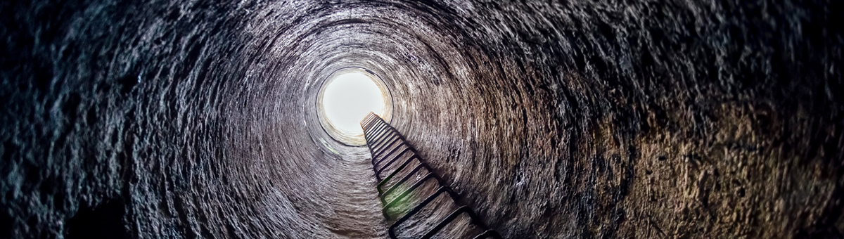 ladder leading to light at end of a tunnel