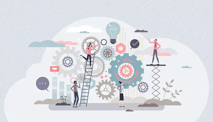 illustration of people working around gears and lightbulbs700px