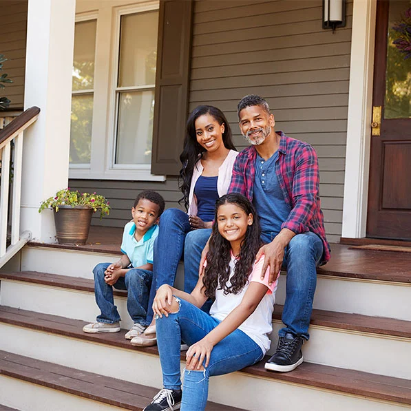 family-sitting-on-stairs